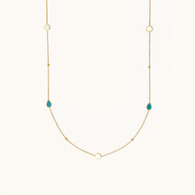 Load image into Gallery viewer, Front view of 18K gold dual-wear necklace with turquoise stone and mother of pearl accents on a delicate chain