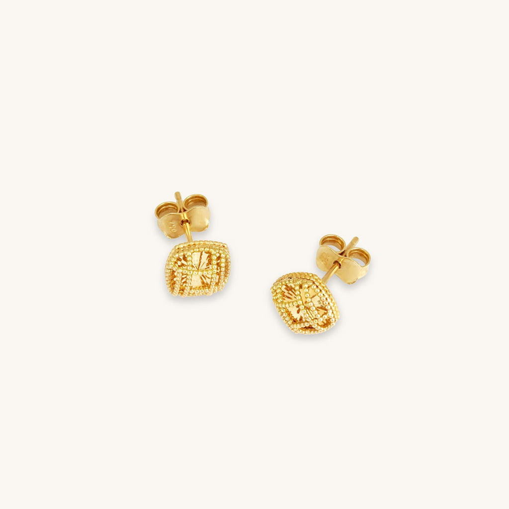 Front view of Joubijoux 18K gold earrings with intricate filigree stud design