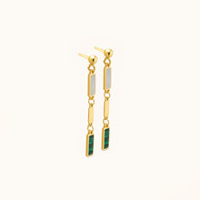 Load image into Gallery viewer, Angled view of 18k gold malachite and mother-of-pearl drop earrings highlighting layered rectangular design
