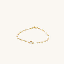 Load image into Gallery viewer, Angled view of 18K gold rectangular link bracelet featuring a moon-inspired mother-of-pearl motif