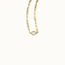 Load image into Gallery viewer, Close-up of round mother-of-pearl pendant set in 18K gold rectangular chain necklace