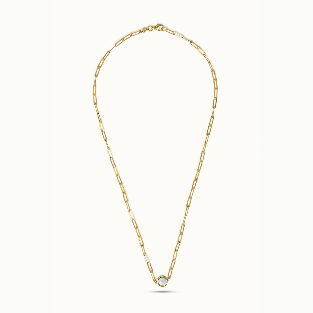 Full length view of 18K gold chain necklace with moon-inspired mother-of-pearl pendant