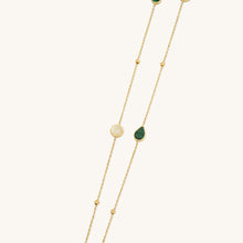 Load image into Gallery viewer, Close-up detail of an 18K gold dual-wear necklace featuring malachite and mother of pearl accents on a delicate chain