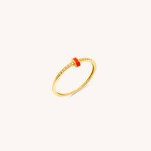 Load image into Gallery viewer, A sleek 18k gold ring with a polished band, accented by a central strip of coral enamel and intricate engravings.
