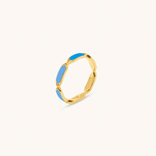 Load image into Gallery viewer, A two-tone blue and gold ring from the Facets collection, with a smooth solid finish and no visible branding or markings.