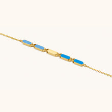 Load image into Gallery viewer, Close-up view  of Joubijoux Facets Fusion gold bracelet showing enamel bar craftsmanship