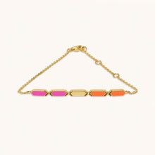 Load image into Gallery viewer, An 18k gold bracelet with vibrant orange and pink facets positioned on a chain, designed to catch light and attention.