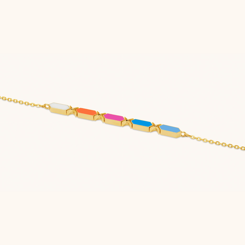 Close-up of Joubijoux Facets Jazzy 18K gold bracelet highlighting enamel craftsmanship and gold finish