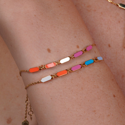 Joubijoux Facets Jazzy 18K gold bracelet worn on wrist showing fit and multi-colored enamel design