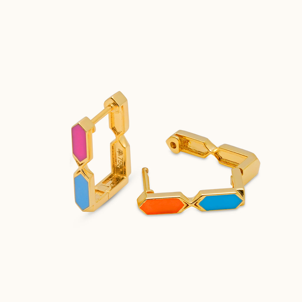 Open flip view of Joubijoux Facets Jazzy 18K gold hoop earrings showing reversible enamel colors and inner structure