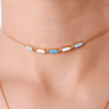 Load image into Gallery viewer, Joubijoux Facets Sky 18K gold choker necklace with blue and white enamel worn on neck