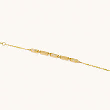 Load image into Gallery viewer, A diamond bracelet with gold chain and diamond segments, featuring a series of diamond pendants aligned in a row. a facets collection from joubijoux