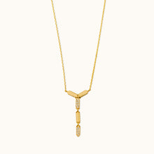 Load image into Gallery viewer, A sleek 18k gold and diamond necklace with precision-cut diamonds in a geometric shape with a hint of sparkle, displayed against a white background.