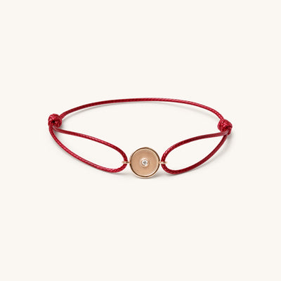 Front view of Joubijoux gold bracelet for women in 18K rose gold featuring a barrel design with single VS diamond