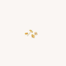 Load image into Gallery viewer, Pair of Joubijoux 18K gold earrings with filigree stud detailing in flat lay view showing screw backs
