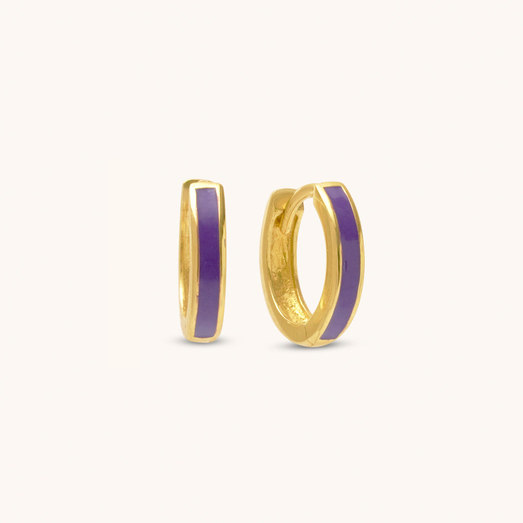 Front view of Joubijoux 18K gold hoop earrings with indigo enamel detailing