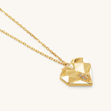 Load image into Gallery viewer, Close-up of Joubijoux gold necklace design highlighting faceted heart shape white enamel and six VS diamonds