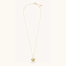 Load image into Gallery viewer, Flat lay view of Joubijoux gold necklaces for women showing full 18K gold chain with heart-shaped emerald pendant