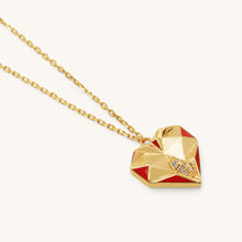 Load image into Gallery viewer, Close-up of Joubijoux gold necklaces for women highlighting faceted heart design red enamel and VS diamond detailing