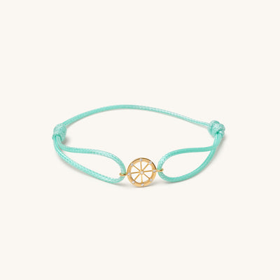 Front view of Kaleido In Motion diamond gold bracelet in 18K yellow gold with circular wheel design