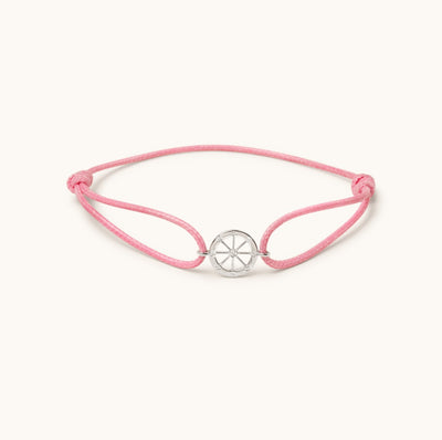 Front view of Kaleido In Motion gold bracelet in 18K white gold with diamond watch wheel design