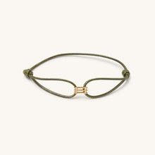 Load image into Gallery viewer, Front view of Kaleido Triad gold bracelet in 18K yellow gold featuring three parallel lines with VS diamond accents