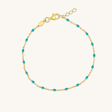 Load image into Gallery viewer, 18K gold raindrop bracelet with blue enamel accents in a delicate fine chain design