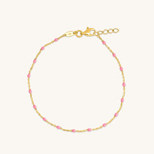 Load image into Gallery viewer, 18K gold raindrop bracelet with pink enamel accents in a delicate chain design