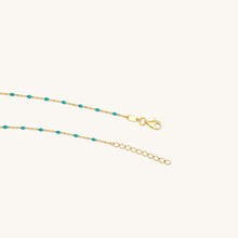Load image into Gallery viewer, Close-up of blue enamel beads and gold clasp on raindrop bracelet
