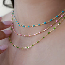 Load image into Gallery viewer, Woman wearing blue enamel 18K gold raindrop bracelet on wrist