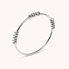 Load image into Gallery viewer, 18K white gold diamond bangle with screw-inspired modern design