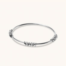 Load image into Gallery viewer, Full view of 18K white gold screw-style diamond bangle