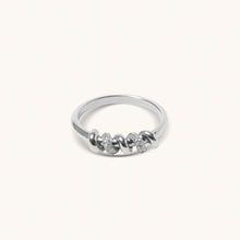 Load image into Gallery viewer, Top view of white gold screw motif ring with pavé diamonds