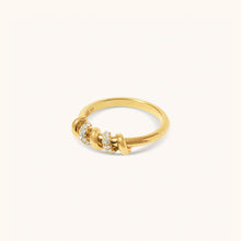Load image into Gallery viewer, Side angle of yellow gold diamond ring featuring screw-inspired detailing
