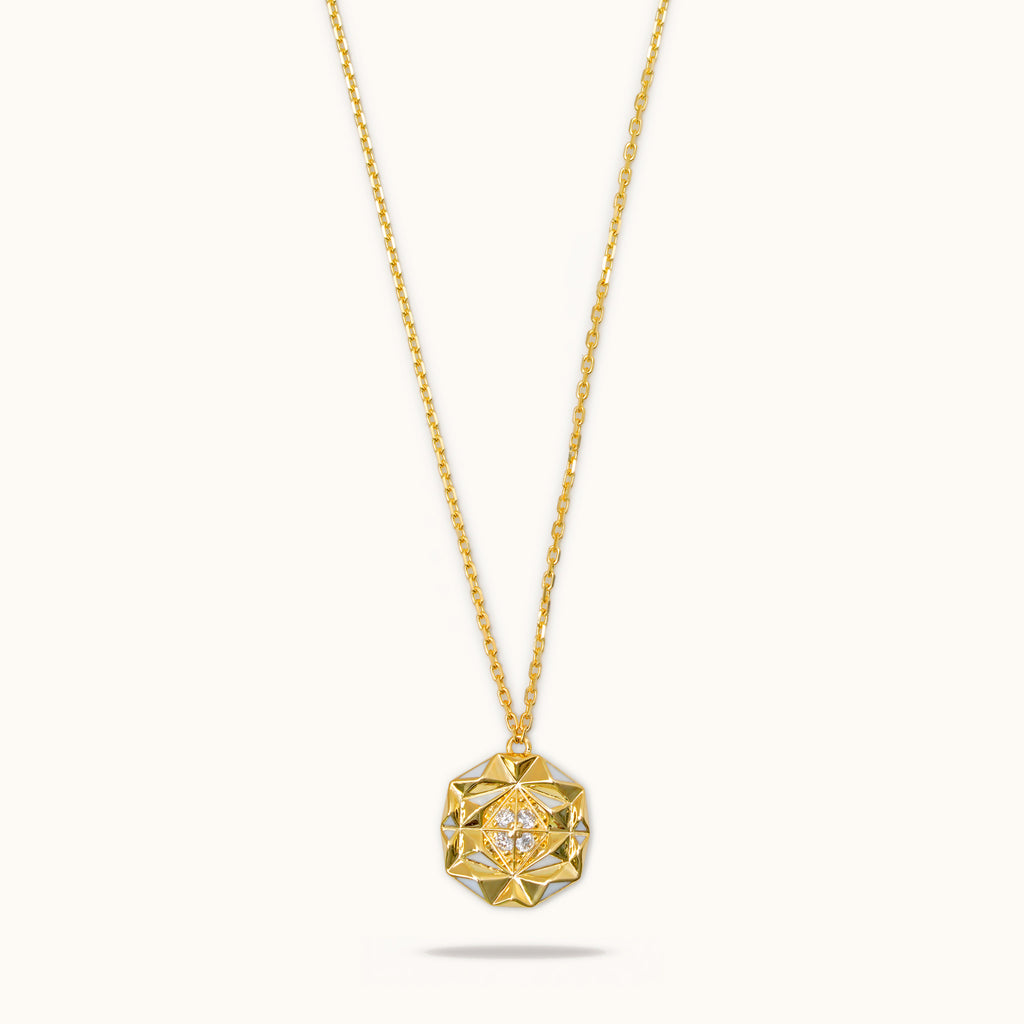 Slopes diamond necklace in 18K gold with geometric pendant and white enamel detailing