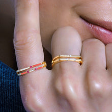 Load image into Gallery viewer, Versa diamond and pink sapphire ring worn on hand in 18K gold with enamel accents