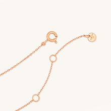 Load image into Gallery viewer, Close-up of Versa Mini 18K rose gold necklace showing adjustable loops and clasp