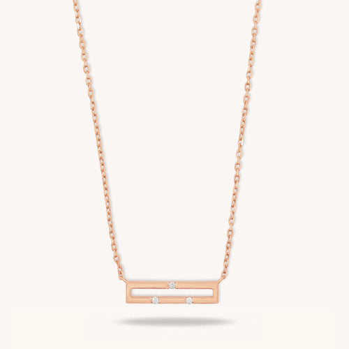 Front view of Versa Mini 18K rose gold necklace with three natural diamonds