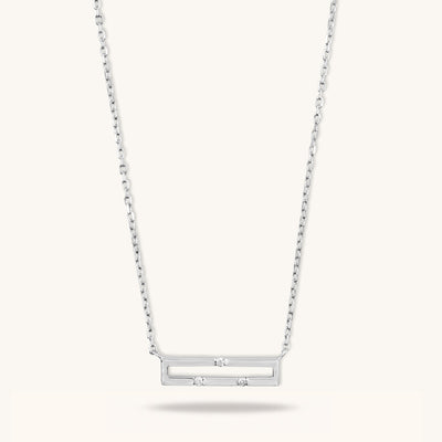Front view of Versa Mini 18K white gold necklace with three natural diamonds