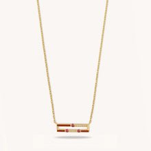 Load image into Gallery viewer, Front view of Versa mini ruby necklace showing red enamel, diamonds, and ruby stones in 18K gold