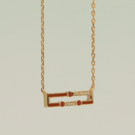 Rotating video of Versa mini emerald and ruby reversible necklace in 18K gold showing both sides
